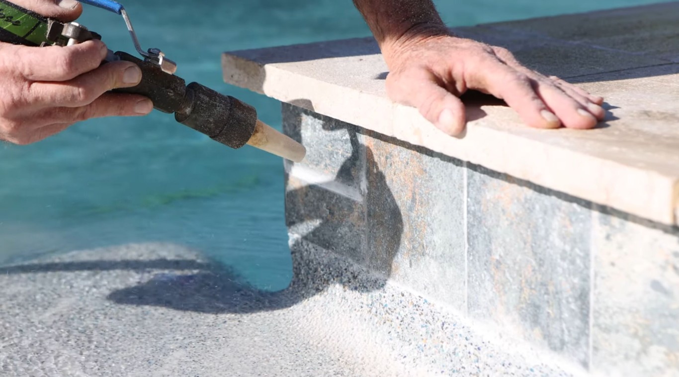 Professional pool tile cleaning and calcium removal service in Miami Gardens, FL
